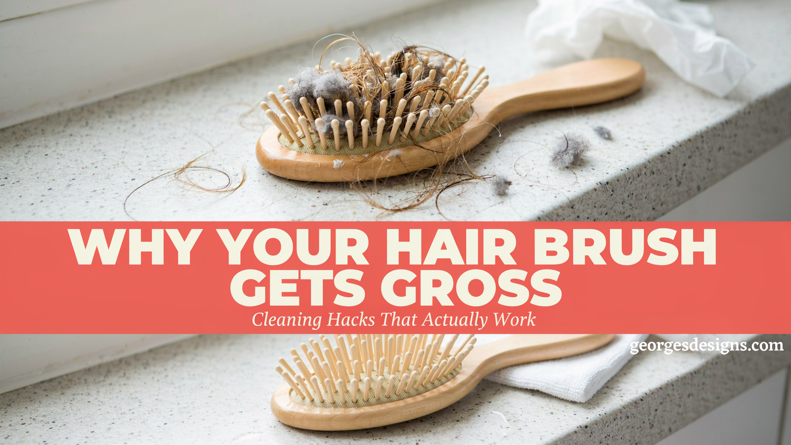 Wooden paddle hair brush with accumulated hair and lint buildup sitting on a granite countertop next to a clean brush, showing the pet fur and debris that collects during regular grooming.